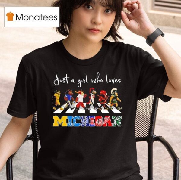 Just A Girl Who Loves Michigan Wolverines Lions Tigers Pistons Wings And Spartan Mascots Walking Across T Shirt