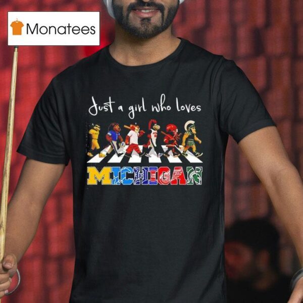 Just A Girl Who Loves Michigan Wolverines Lions Tigers Pistons Wings And Spartan Mascots Walking Across T Shirt