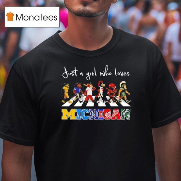 Just A Girl Who Loves Michigan Wolverines Lions Tigers Pistons Wings And Spartan Mascots Walking Across T Shirt