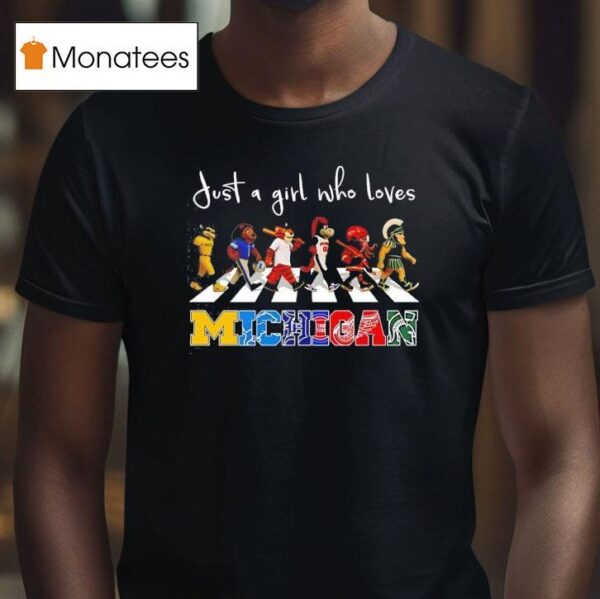 Just A Girl Who Loves Michigan Wolverines Lions Tigers Pistons Wings And Spartan Mascots Walking Across T Shirt